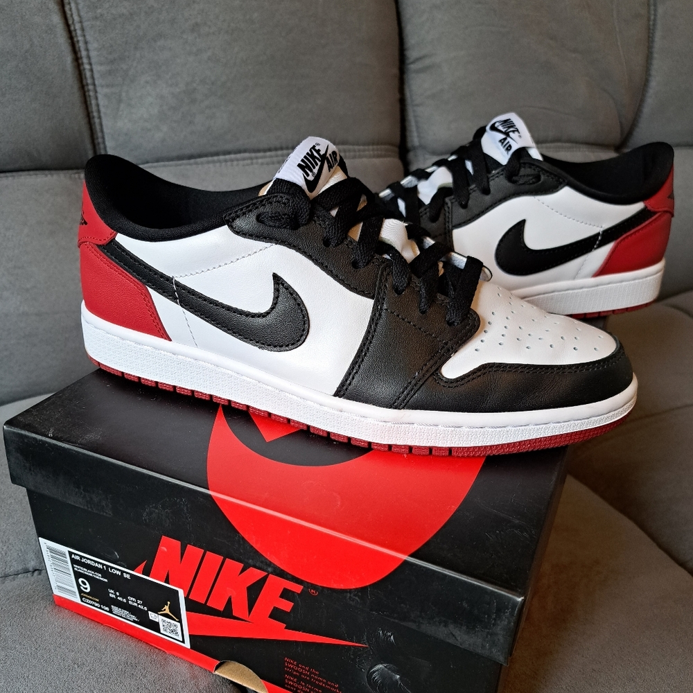 Nike Air Jordan 1s low black toe